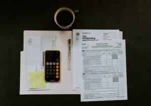 Black android smartphone near tax papers of can land be a 1231 asset
