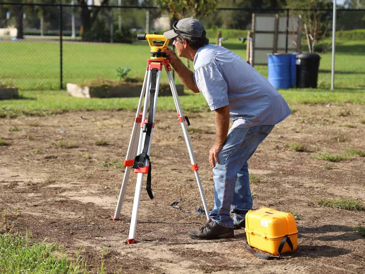 A Man Doing Land Surveying As Part of The Land Asset Management